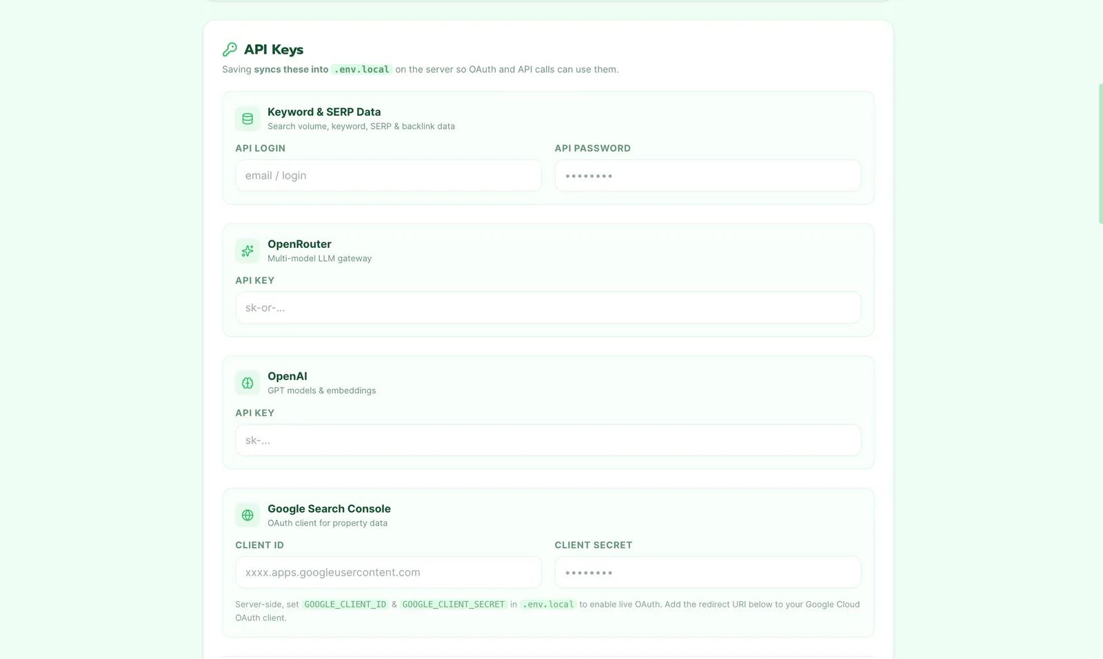 The API keys screen in RanknestAI with fields for the keyword and SERP data provider, OpenRouter, OpenAI and the Google Search Console OAuth client, saved into a local env file.
